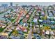 An aerial view of a cozy home nestled in a vibrant neighborhood, close to amenities and city attractions at 17595 1St E St, Redington Shores, FL 33708