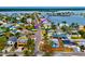 An aerial view of a cozy home near a city park and playground, nestled in a friendly neighborhood at 17595 1St E St, Redington Shores, FL 33708