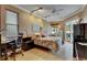 Bedroom featuring ceiling fan, closet and outdoor access to the pool at 17711 Hampshire Oak Dr, Tampa, FL 33647