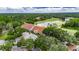 Beautiful golf course with the clubhouse overlooking a scenic pond at 17711 Hampshire Oak Dr, Tampa, FL 33647