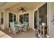 Covered outdoor patio featuring comfortable seating and a serene atmosphere, perfect for relaxation and outdoor enjoyment at 17711 Hampshire Oak Dr, Tampa, FL 33647