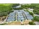 Aerial view of multiple tennis courts surrounded by lush greenery at 17711 Hampshire Oak Dr, Tampa, FL 33647
