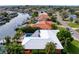 Waterfront home with private boat dock, pool, and lush tropical landscaping at 1960 Montana Ne Ave, St Petersburg, FL 33703