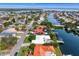 Waterfront neighborhood with houses, private boat docks, and lush trees at 1960 Montana Ne Ave, St Petersburg, FL 33703