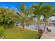 Lush, green backyard overlooking a serene waterway, perfect for boaters at 1960 Montana Ne Ave, St Petersburg, FL 33703