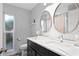 Bathroom featuring marble vanity top with dual mirrors at 1960 Montana Ne Ave, St Petersburg, FL 33703