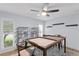 Bright living room with a ceiling fan and natural light at 1960 Montana Ne Ave, St Petersburg, FL 33703