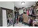 Well-organized walk-in closet with ample storage, shelving, and mirrored door at 1960 Montana Ne Ave, St Petersburg, FL 33703