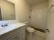 Clean bathroom featuring a tiled shower, modern fixtures, and a new vanity at 206 Circle Hill Dr, Brandon, FL 33510