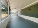 Large, screened-in lanai with painted floor; perfect for outdoor living at 206 Circle Hill Dr, Brandon, FL 33510
