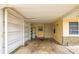 Attached carport offers covered parking and additional storage at 230 Portree Dr, Dunedin, FL 34698