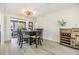 Dining area featuring a table with seating for four, perfect for everyday meals or entertaining guests at 2724 Ashwood Ct, Clearwater, FL 33761