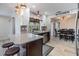 Beautiful kitchen with a breakfast bar, stainless steel appliances, and an open layout to the dining room at 2724 Ashwood Ct, Clearwater, FL 33761