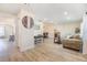 Open-concept living area with hardwood floors and neutral tones for a warm and inviting atmosphere at 2724 Ashwood Ct, Clearwater, FL 33761