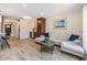 Spacious living room showing the open floor plan with neutral colors and ample seating at 2724 Ashwood Ct, Clearwater, FL 33761