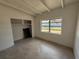 Bedroom featuring a built-in closet and large window overlooking the backyard at 3000 58Th S Ave, St Petersburg, FL 33712