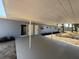 Wide-angle view of carport with concrete floor providing ample covered parking at 3000 58Th S Ave, St Petersburg, FL 33712