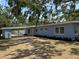 Charming single-story home with a carport, freshly painted exterior, and well-maintained landscaping at 3000 58Th S Ave, St Petersburg, FL 33712