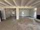 Spacious living room with white brick accent wall and plenty of natural light at 3000 58Th S Ave, St Petersburg, FL 33712