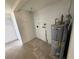Utility room with a water heater at 3000 58Th S Ave, St Petersburg, FL 33712