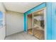 View of condo balcony with sliding glass doors leading to interior showcasing the beautiful wood flooring at 3315 58Th S Ave # 605, St Petersburg, FL 33712