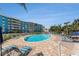 Beautiful outdoor pool area with ample seating, perfect for relaxation and enjoyment at 3315 58Th S Ave # 605, St Petersburg, FL 33712