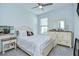 Bright bedroom with neutral walls, carpet floors, and a matching furniture set at 33518 Castaway Loop, Wesley Chapel, FL 33543