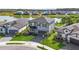 Aerial view of the beautiful home backing onto a serene lake in a desirable neighborhood at 34307 Radley Way, Wesley Chapel, FL 33545