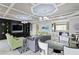 Stylish clubhouse interior with a sleek bar, modern seating and a sophisticated entertainment area at 34307 Radley Way, Wesley Chapel, FL 33545