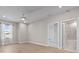 Spacious main bedroom with hardwood floors and ensuite bathroom creates a peaceful retreat at 34307 Radley Way, Wesley Chapel, FL 33545