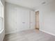 Light-filled bedroom features a large closet and neutral-colored carpet at 3818 Farm Garden Ct, Lakewood Ranch, FL 34211