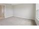 Bedroom with neutral walls, carpet, and an abundance of space at 3818 Farm Garden Ct, Lakewood Ranch, FL 34211