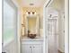 Stylish bathroom features granite counters, bowl sink, and modern fixtures at 4224 Fleewell Ct, Valrico, FL 33596