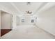 Bright bedroom with carpeted floors and a ceiling fan at 4224 Fleewell Ct, Valrico, FL 33596