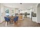 Bright and spacious kitchen with white cabinets, stainless steel appliances, and eat-in breakfast area at 4224 Fleewell Ct, Valrico, FL 33596