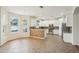Bright and spacious kitchen with white cabinets, stainless steel appliances, and eat-in breakfast area at 4224 Fleewell Ct, Valrico, FL 33596
