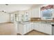 Bright kitchen features granite counters, stainless steel appliances and tile flooring at 4224 Fleewell Ct, Valrico, FL 33596