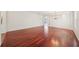 Expansive living room with hardwood floors, offering a versatile space for various activities and gatherings at 4224 Fleewell Ct, Valrico, FL 33596