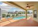 Screened-in pool area with hot tub and spacious patio, perfect for outdoor entertaining at 4224 Fleewell Ct, Valrico, FL 33596