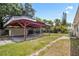 View of a backyard with a covered parking area at 5015 15Th S Ave, Gulfport, FL 33707