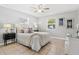 Cozy bedroom with soft lighting, comfortable bed, and simple, elegant decor at 5015 15Th S Ave, Gulfport, FL 33707