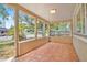 Inviting front porch featuring tile flooring, offering a great place to relax at 5015 15Th S Ave, Gulfport, FL 33707