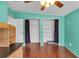 Well-lit bedroom with two large closets with modern, built-in shelving at 520 Canal Way, Oldsmar, FL 34677