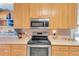 Bright kitchen with stainless steel range and oven at 520 Canal Way, Oldsmar, FL 34677