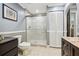 Main bathroom featuring a glass shower and tiled floor at 5245 18Th N St, St Petersburg, FL 33714
