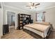Bedroom featuring a built-in bookcase, a closet and a queen-sized bed at 5245 18Th N St, St Petersburg, FL 33714