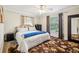 Bright bedroom featuring a comfortable bed, side tables and an area rug at 5245 18Th N St, St Petersburg, FL 33714