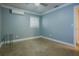 Comfortable bedroom with a window and ceiling fan at 5803 Cresthill Dr, Tampa, FL 33615