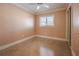 Cozy bedroom with natural lighting, neutral walls, and carpet floors at 5803 Cresthill Dr, Tampa, FL 33615