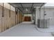 A fenced-in carport area with space for an air conditioner and covered ceiling at 5803 Cresthill Dr, Tampa, FL 33615
